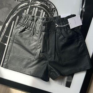 Womens vegan leather black short size large new with tags